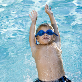 child back gliding in water